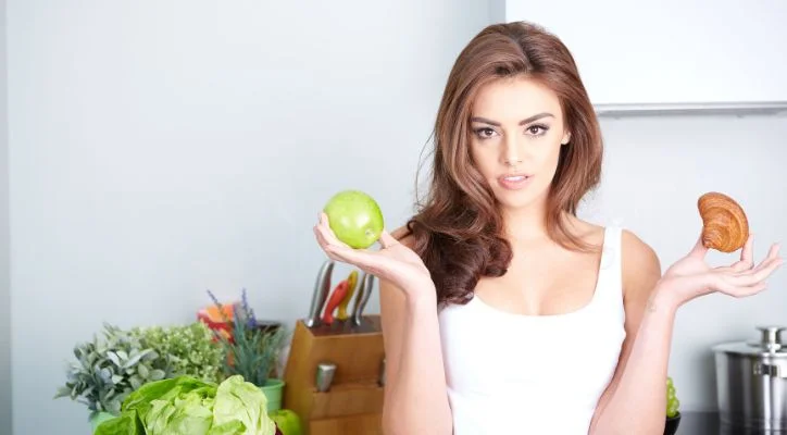 woman handling an apple